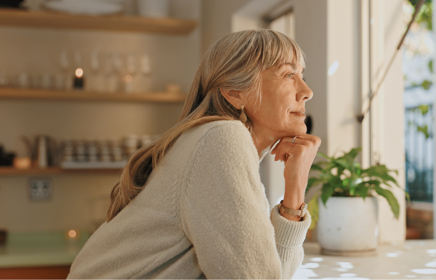 Person looking out of the window considering Individual Therapy